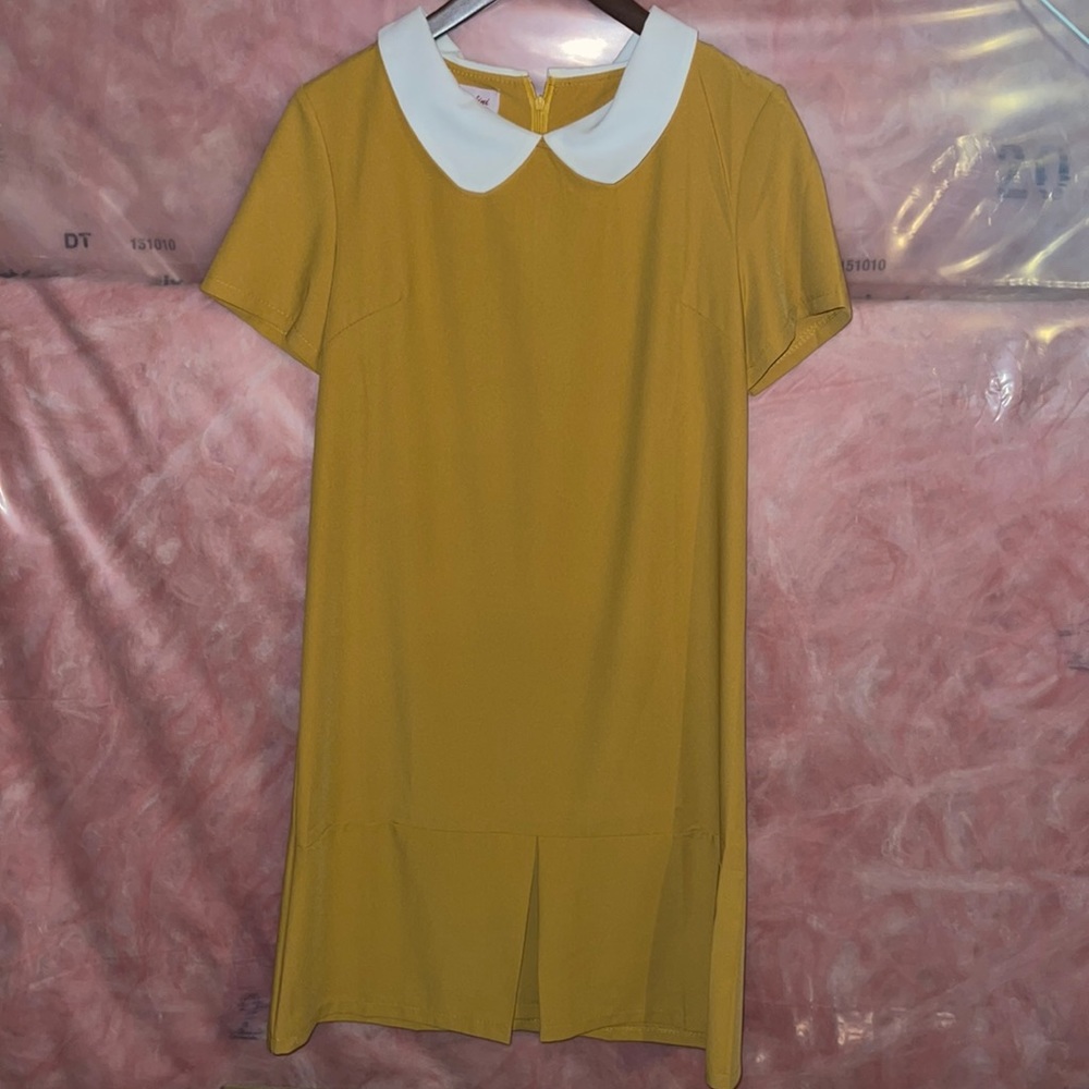 A gorgeous yellow knee length dress